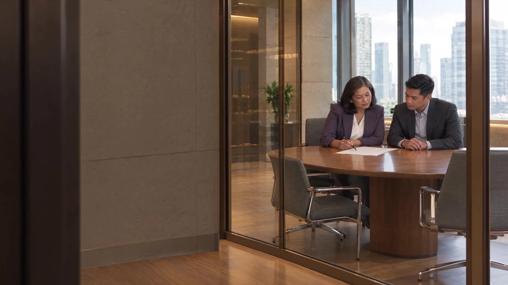 Colleagues at work in a warm, contemporary law office.